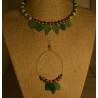 Women's choker set with glass & golden beads accentuated with glass leaves.