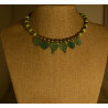 Women's choker set with glass & golden beads accentuated with glass leaves.