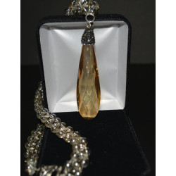 Glass beaded/rhinestone necklace accentuated with a beautiful pendant